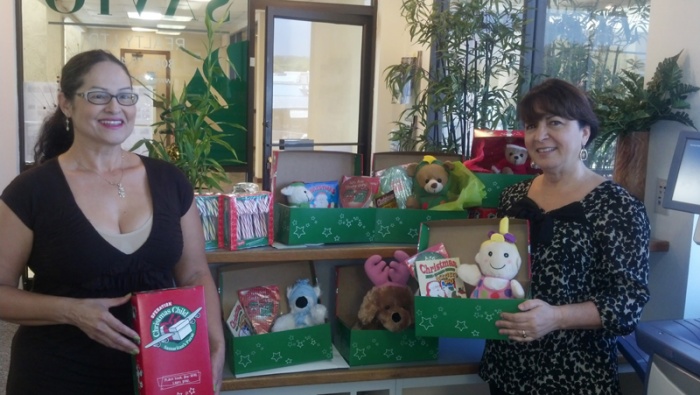 Blanca Ardry and Darlene Peralto join Hope Chapel in ensuring a Merry Christmas for needy children around the world.